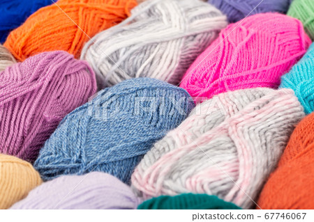 Stack of knitting yarn clews Stack of knitting yarn clews 67746067