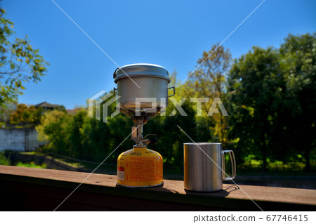 Image of camp gas stove and mug (1) Image of camp gas stove and mug (1) 67746415