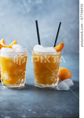 Summer juice with apricots and ice Summer juice with apricots and ice 67749450