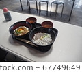 Obi-zuke bowl of raw sardines and half bowl of fried sardines with raw shirasu 67749649