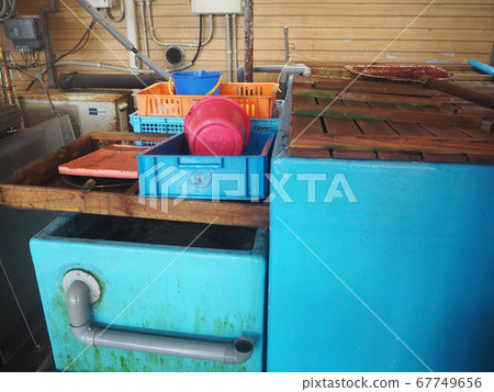 Scenery of fish cages at the fish market in the port Scenery of fish cages at the fish market in the port 67749656