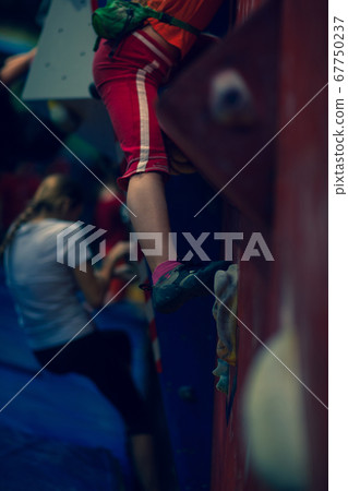 Children climb up the wall with stops 67750237