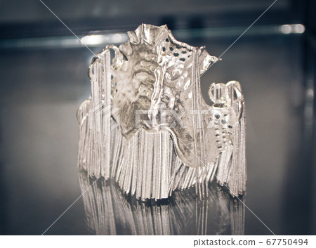 Object printed on metal 3d printer close-up 67750494