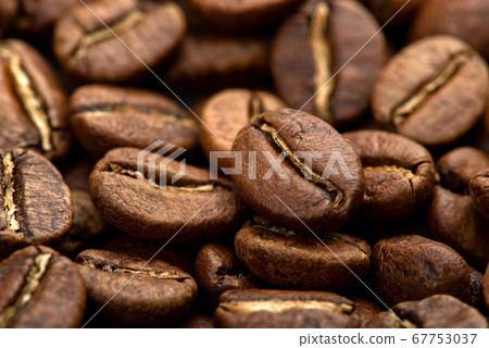 Coffee beans close-up background. Fresh roasted Coffee beans close-up background. Fresh roasted 67753037