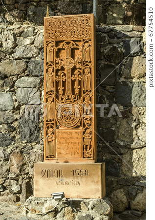 Copy of the khachkar,with the faces of the holy apostles carved from the 16th century from Jugha,along the road leading to the monastery of Gegard   67754510