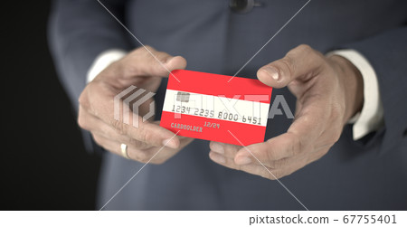 Businessman holding plastic bank card with printed flag of Austria, fictional numbers Businessman holding plastic bank card with printed flag of Austria, fictional numbers 67755401