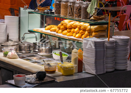 Vietnamese banh mi food stand's kitchen in foodcourt Vietnamese banh mi food stand's kitchen in foodcourt 67755772