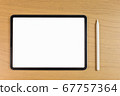 Mockup of tablet and stylus pen on the desk Mockup of tablet and stylus pen on the desk 67757364