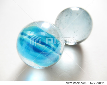 Two marbles 67759894