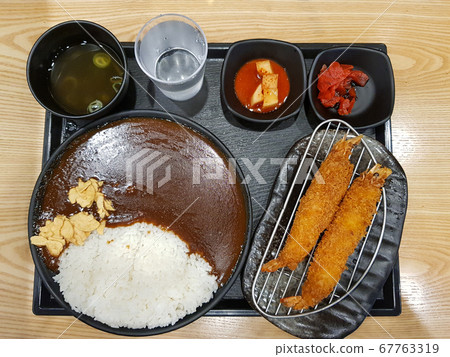 Hot and spicy curry rice lunch set with shrimp Tonkatsu and Kimchi and onion soup Hot and spicy curry rice lunch set with shrimp Tonkatsu and Kimchi and onion soup 67763319