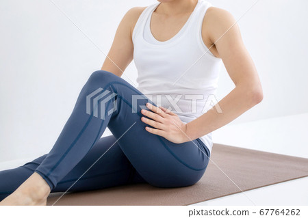 A woman wearing sportswear A woman wearing sportswear 67764262
