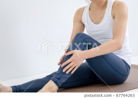 A woman wearing sportswear A woman wearing sportswear 67764263