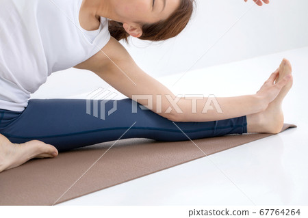 A woman wearing sportswear 67764264