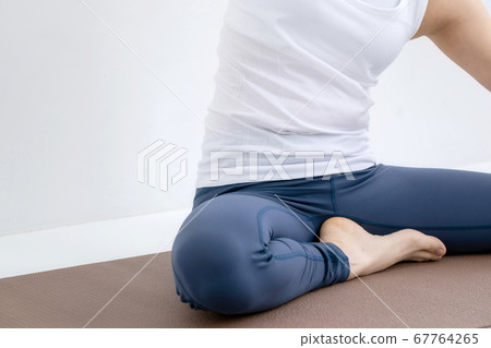 A woman wearing sportswear A woman wearing sportswear 67764265