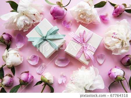Peonies and gift boxes Peonies and gift boxes 67764318