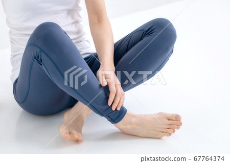 A woman wearing sportswear A woman wearing sportswear 67764374