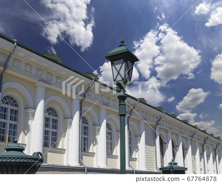 Manege Exhibition Hall (Manege Square near the Kremlin) on a beautiful sky with cloud before sunset background in Moscow. Russia 67764878