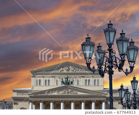 Bolshoi Theatre (Large, Great or Grand Theatre, also spelled Bolshoy) on a beautiful sky with cloud before sunset background, Moscow, Russia Bolshoi Theatre (Large, Great or Grand Theatre, also spelled Bolshoy) on a beautiful sky with cloud before sunset background, Moscow, Russia 67764913