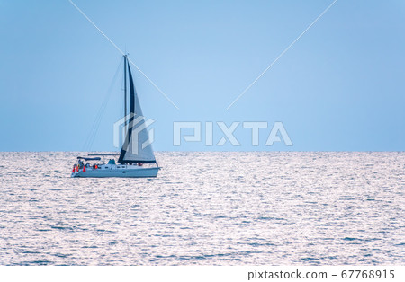 Sailing yacht in the blue calm sea. 67768915