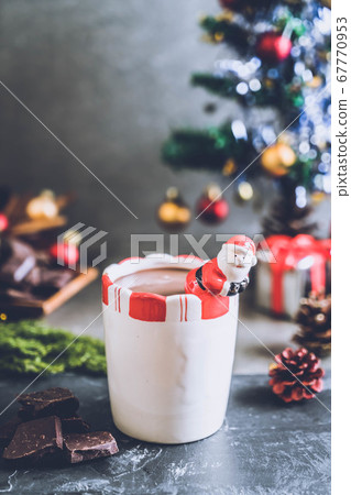 hot chocolate cup with christmas decoration 67770953