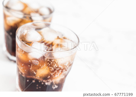 glass of cola with ice glass of cola with ice 67771199
