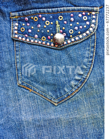 Pocket on jeans fashion denim fabric background Pocket on jeans fashion denim fabric background 67772237