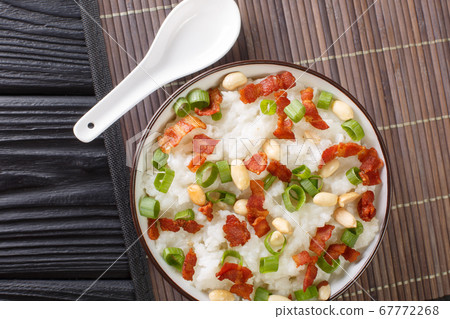 Ginger bacon Jook Rice Porridge close-up in a Ginger bacon Jook Rice Porridge close-up in a 67772268