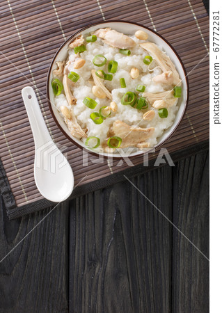 Ginger chicken Jook Rice Porridge close-up in a Ginger chicken Jook Rice Porridge close-up in a 67772281