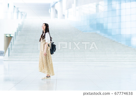 College student walking on campus College student walking on campus 67774638
