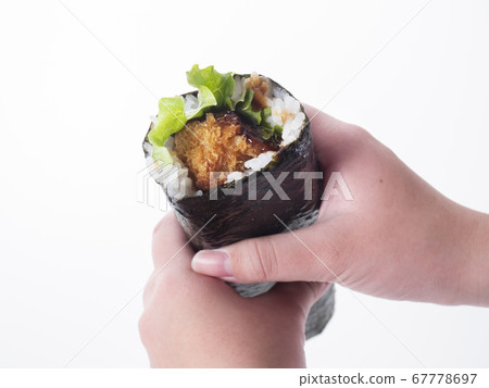 Female hand with ehomaki Female hand with ehomaki 67778697