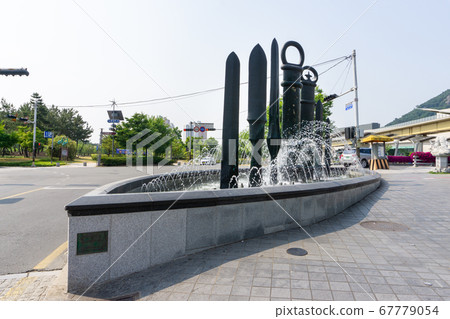 Statuary of the legenday Korean weapons in the fountain on the footpath in Gimehae, South Gyeongsang province, South Korea. Statuary of the legenday Korean weapons in the fountain on the footpath in Gimehae, South Gyeongsang province, South Korea. 67779054