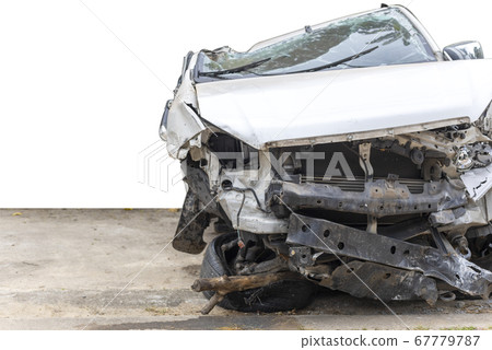 White color car damaged and broken by accident . 67779787