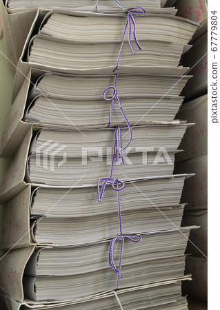 Extremely close up of the stacked office documents Extremely close up of the stacked office documents 67779804