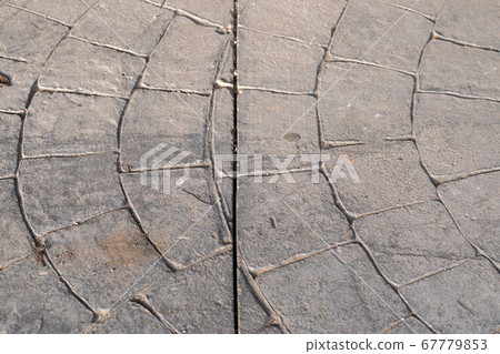 Dilatation joint on surfaces of stamped concrete pavement Dilatation joint on surfaces of stamped concrete pavement 67779853