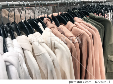 Different types of winter sweaters for sale at a 67780301