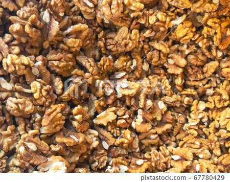 Close-Up Of Peeled Fresh Walnuts Background Close-Up Of Peeled Fresh Walnuts Background 67780429