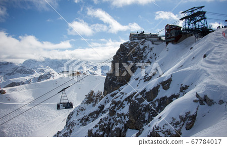 Pic de Saulire courchevel cabin station with gondola view sunset snowy mountain landscape France alpes Pic de Saulire courchevel cabin station with gondola view sunset snowy mountain landscape France alpes 67784017
