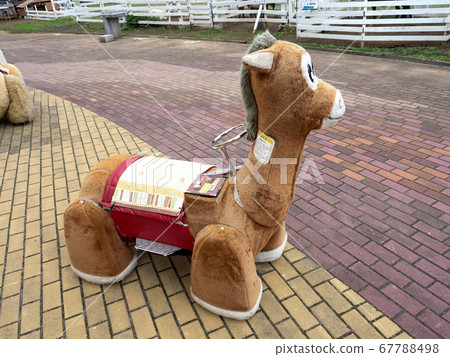 Battery car at amusement facility 67788498