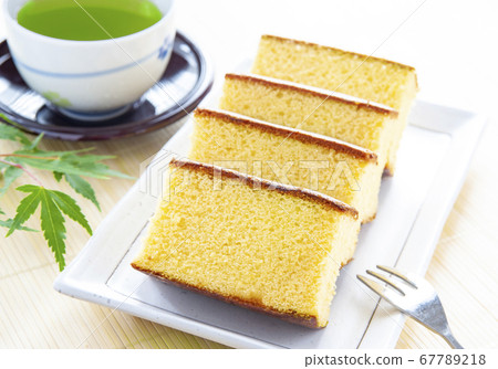 Castella, green tea and autumn leaves cut into pieces Castella, green tea and autumn leaves cut into pieces 67789218