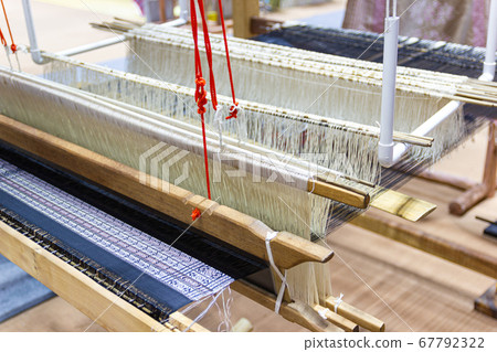 Weaving equipment Household weaving - Detail of weaving loom for homemade silk Used for silk weaving or textile production of Thailand 67792322