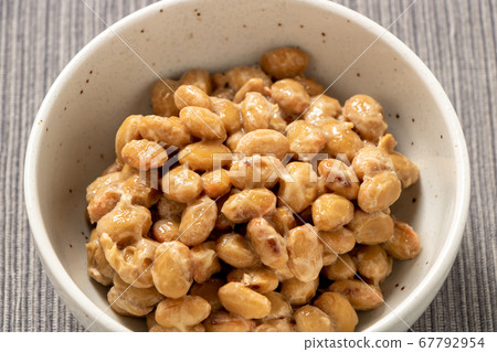 Natto in a small bowl. (No spices or toppings.) Natto in a small bowl. (No spices or toppings.) 67792954