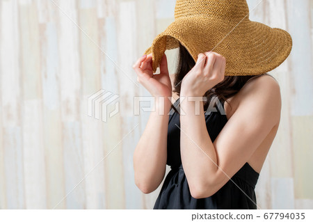 A woman in a bathing suit A woman in a bathing suit 67794035
