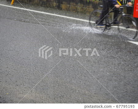 Road flood heavy rain natural disaster 67795193