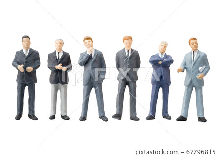 Miniature people businessman on white background Miniature people businessman on white background 67796815