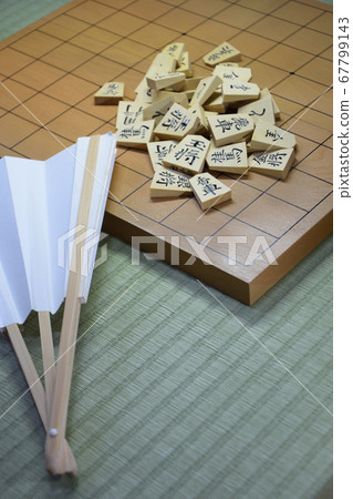 Shogi pieces and fans 67799143