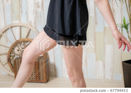 A woman in a bathing suit A woman in a bathing suit 67799453