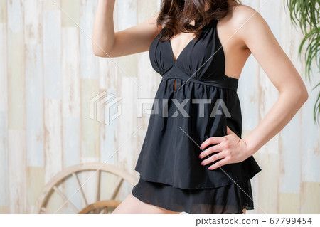 A woman in a bathing suit A woman in a bathing suit 67799454