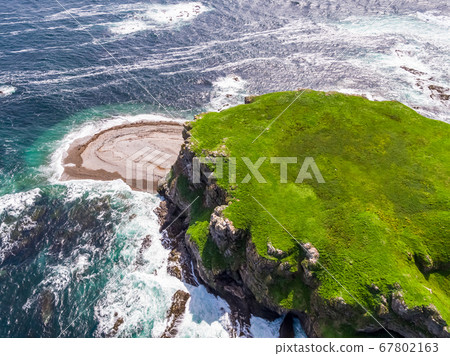 Aerial of Glashedy Island , an uninhabitated island west of Trawbreaga Bay - Donegal, Ireland 67802163