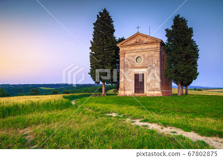 Old Vitaleta chapel on the grain field in Tuscany, Italy Old Vitaleta chapel on the grain field in Tuscany, Italy 67802875