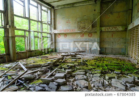 Abandoned school gym in resettled village of Pogonnoe in Chernobyl exclusion zone, Belarus 67804385
